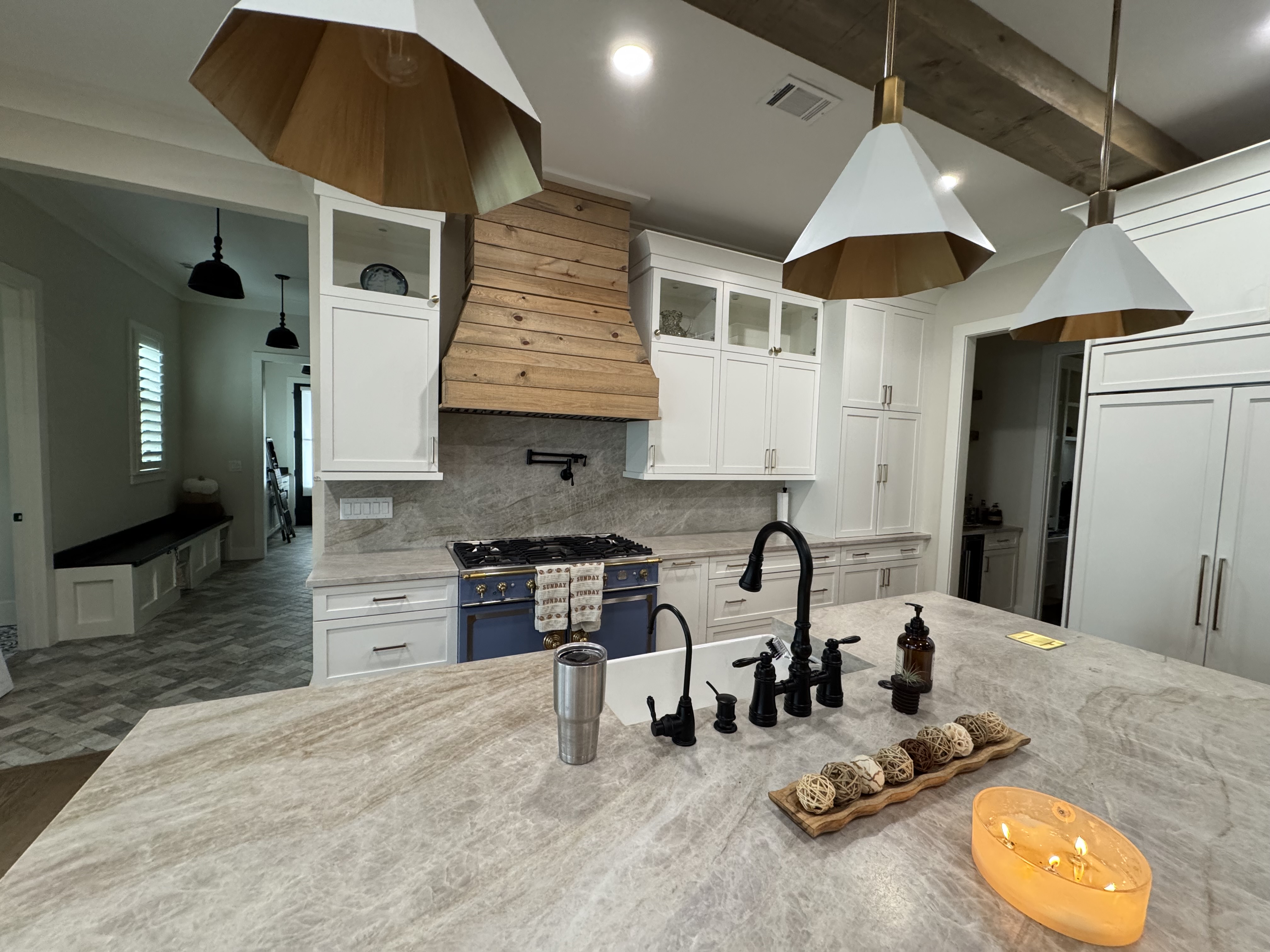 Kitchen renovation – quartz tops and full-height backsplash