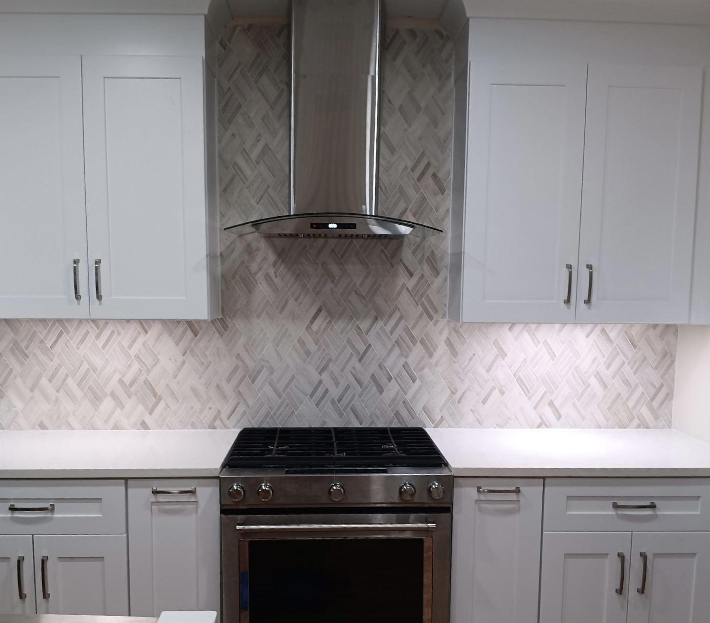 Kitchen renovation – quartz tops and full-height backsplash